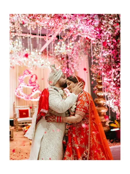 The moment the world fades away. I live for these explosions of joy, like this varmala ceremony, where a shower of flowers marks the beginning of a lifetime of laughter and love. It's pure, unscripted magic.