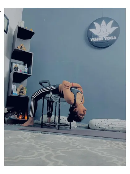 Using a chair as a prop to safely explore a deep backbend, Dvi Pada Viparita Dandasana. Props help us understand the alignment of advanced poses before we have the full strength to do them unsupported.