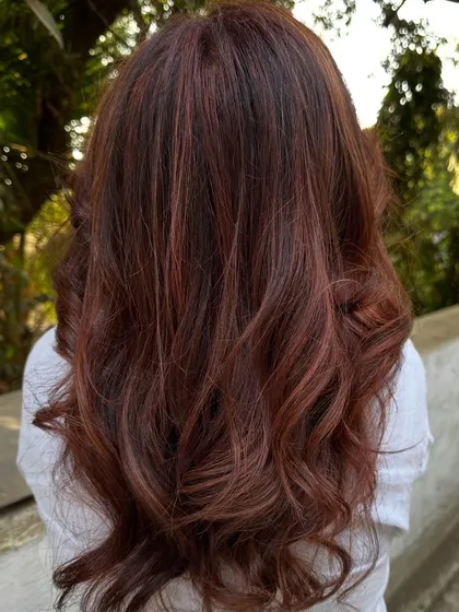 More of the 'Cowboy Copper' trend that I'm loving. This rich, warm red-brown shade is so flattering and gives the hair an incredible vibrancy and shine. I always use K18 to keep the hair healthy during the process.