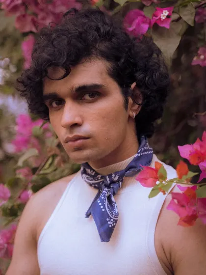 A clean version of the flower portrait, showing a direct and confident gaze. A strong choice for a creative headshot.