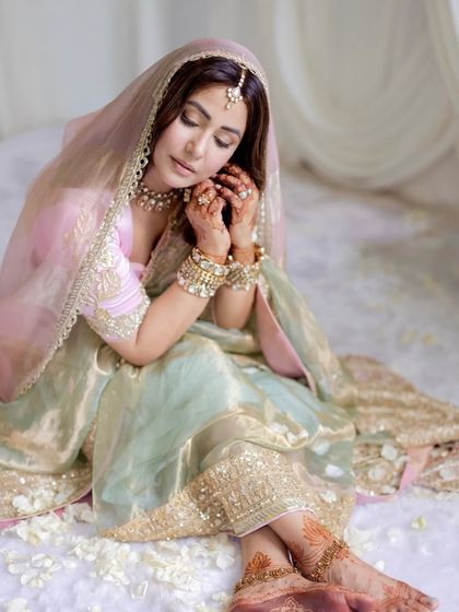 A quiet, reflective moment. The soft, cloud-like floor and delicate floral details created a dreamy atmosphere, perfect for capturing these intimate portraits.