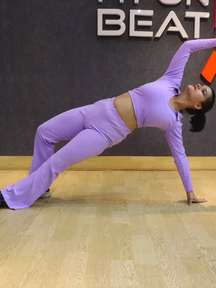 This wild thing pose, or Camatkarasana, is a great example of combining strength and flexibility. It opens up the chest and shoulders while strengthening the arms and back. It's a beautiful expression of power.