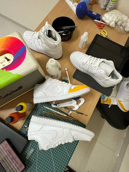 A bird's eye view of my messy desk during a work session. You can see multiple projects happening at once.