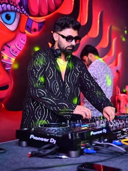 A focused moment during my set at Tipsy Bull, with the cool green lighting.