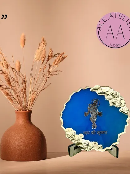 A 5-inch Krishna mantra frame in royal blue with a gold geode design, capturing the playful spirit of Kanha.
