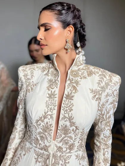 Another angle of the stunning makeup and hair for the Manish Malhotra show, demonstrating how the look comes together with the embroidered outfit.