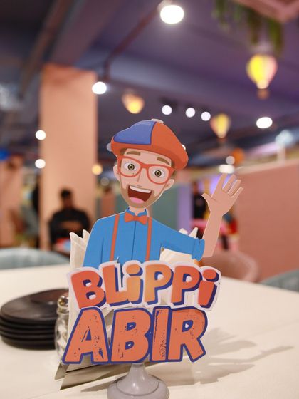 "Hey, it's me, Blippi!" We bring the educational fun of Blippi to life with themed decor, like this custom table centerpiece, and activities inspired by the popular character.