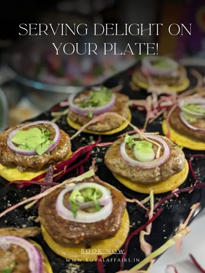 I serve delight on every plate, like these mini Galouti Kebab sliders. The soft, flavorful kebabs are placed on a small, crisp base and topped with onion and a mint drizzle, offering a taste of Awadhi cuisine in a bite-sized form.