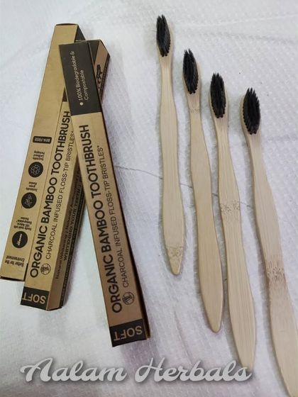 A simple, clean shot of my Organic Bamboo Toothbrushes. The handles are 100% biodegradable, and the soft, charcoal-infused bristles are gentle on your enamel and gums, making them a perfect partner for my herbal tooth powder.