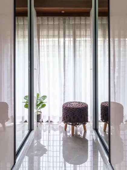 Mirrors are a key design element for us. This image shows how the reflection in the wardrobe doors creates depth and brightens the room.