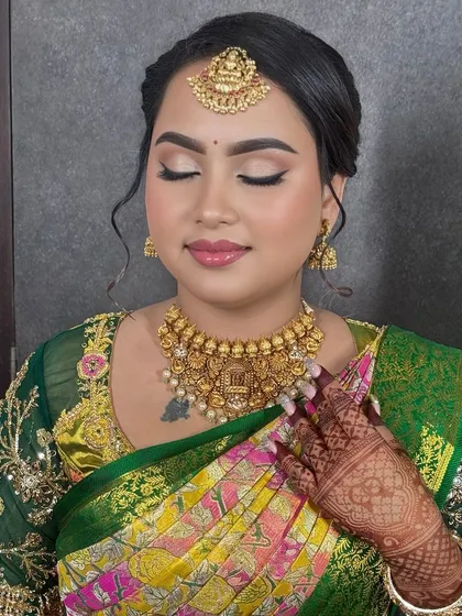 A moment of quiet confidence. The soft, glowing makeup with a touch of shimmer on the eyes makes her look and feel like a queen on her engagement day.