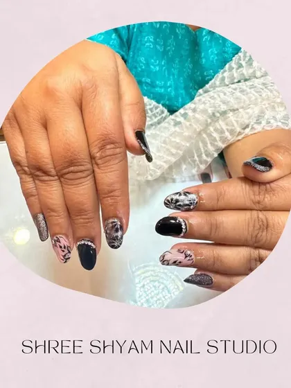 A styled photo of this mixed-media nail art, showing the combination of textures and patterns.