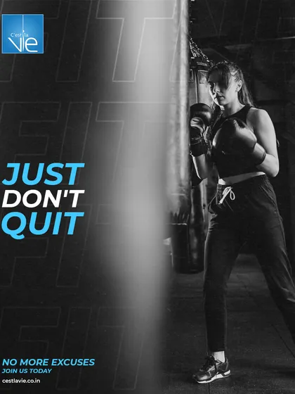 Just don't quit. This motivational image of a female boxer training with a punching bag embodies the resilience and perseverance we encourage in every member.