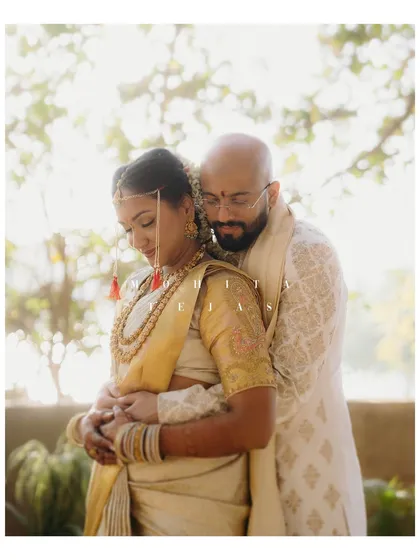 A quiet embrace between Mohita and Tejas. The soft, dreamy light and their gentle hold create a portrait that feels incredibly warm and intimate, a testament to their deep connection.