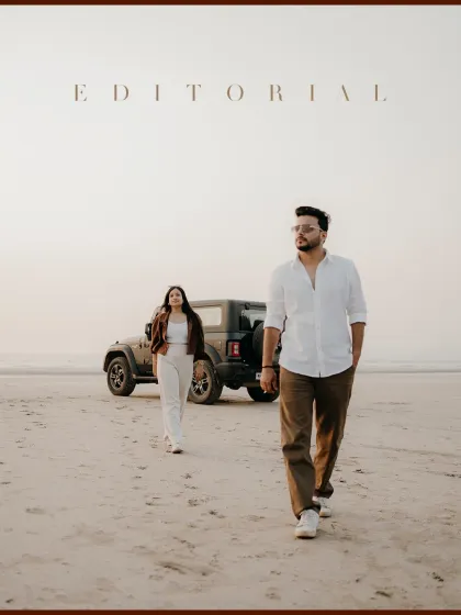 For the adventurous couple, your love story is a journey. Here, we created a modern, editorial-style shot with their Mahindra Thar on the beach, capturing their cool, free-spirited connection.