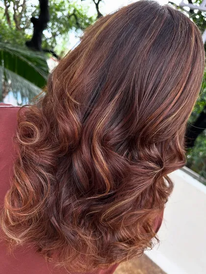 Travel ready. A good hair color and style can make you feel put-together and confident, no matter where you're heading. This warm, multi-tonal look is perfect for any adventure.