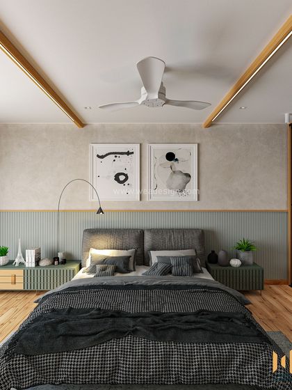 A Scandinavian-inspired bedroom at Raheja Viverea, featuring a custom PU headboard, limewash-painted walls, and light wood flooring for a serene and minimalist feel.