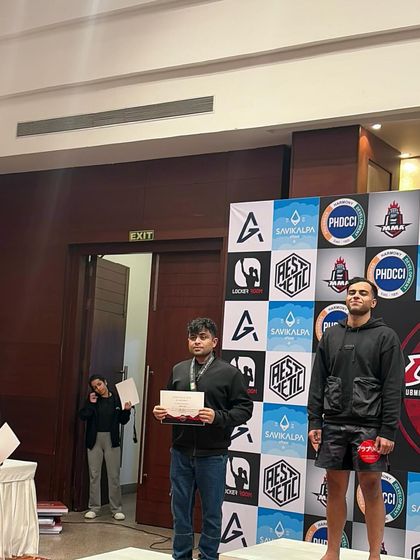 A candid shot of the podium ceremony. The real win is having the courage to compete and put your training to the test.