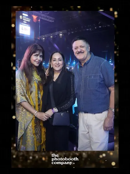 A happy group poses for a photo at the India Gourmet Luxe event. Our booth becomes a popular gathering spot at any large-scale function.