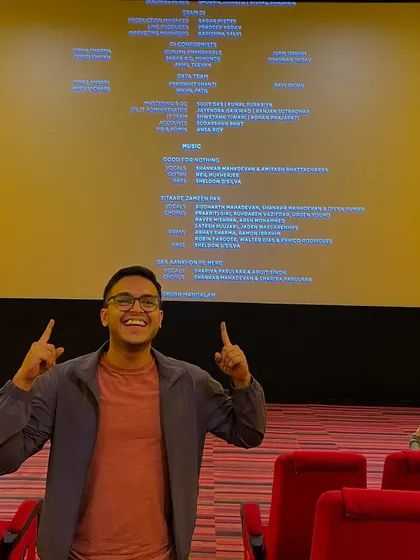 A still shot from the screening, pointing out my name in the credits for 'Sitaare Zameen Par'. Being a part of the chorus for a film of this scale was a huge milestone for me as a session vocalist.