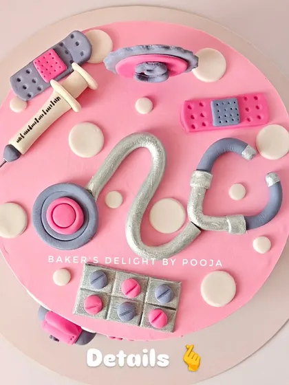 A top-down view of the doctor cake, showing all the meticulously crafted fondant medical tools.