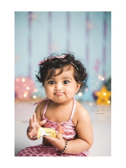 A close-up of our little mermaid, making the cutest pouty face. Themed sessions are perfect for capturing these adorable expressions.