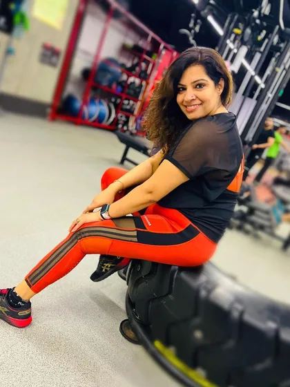 It's not just about the scale; it's about getting stronger. Here's a client celebrating her victory over the tire flip, an exercise she once struggled with. This is what I call non-scale victories.