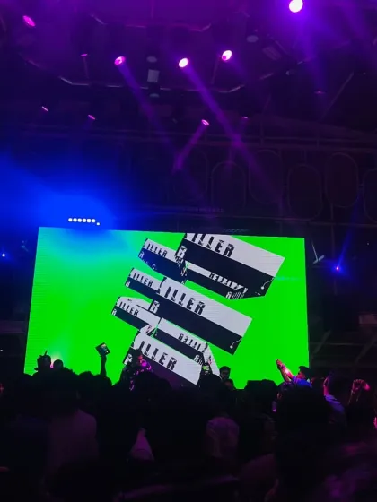 My logo lighting up the big screen above a packed house. A strong visual identity is just as important as the music for creating a memorable night.