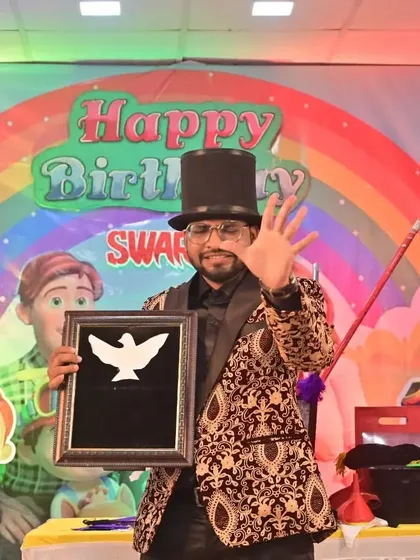 The dove frame illusion is a beautiful and artistic piece of magic. It's a quiet, wondrous moment in a show that is otherwise full of high energy and comedy.