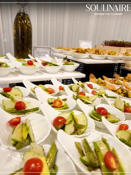 A fresh and vibrant display of Asparagus and Cherry Tomato Salad spoons, showcasing our commitment to elegant, bite-sized appetizers.