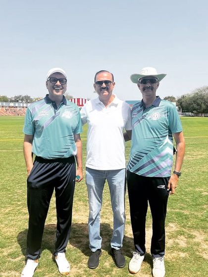 Enjoying the sun and the game with fellow advocates.