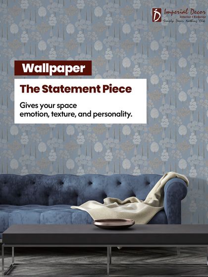 Wallpaper is the statement piece in any room. It gives your space emotion, texture, and personality, like this beautiful blue floral wallpaper that sets a calm and inviting tone for the living room.