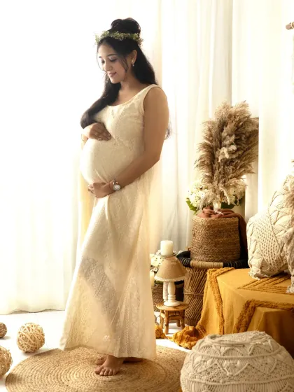 Embracing a soft, earthy feel in my studio for this boho-chic maternity session. The gentle light, the natural textures of the jute rug and macrame, and the simple floral crown all come together to create a peaceful and beautiful portrait of the mother-to-be.