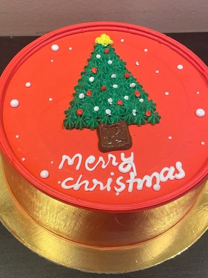 A simple yet festive "Merry Christmas" cake, showing our readiness for seasonal and last-minute holiday orders.