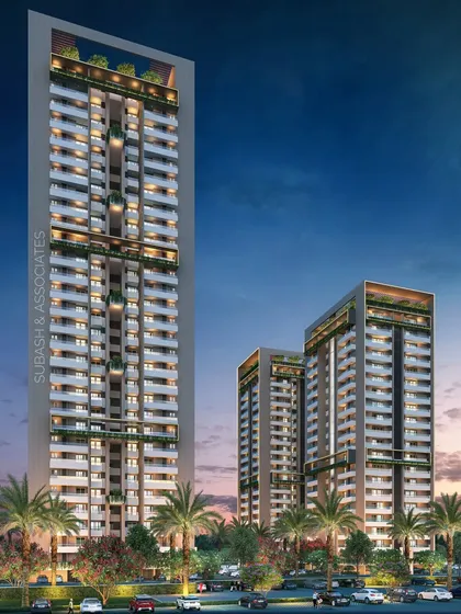 Another view of the upcoming high-rise project, showing the slender profile of the towers against the evening sky.