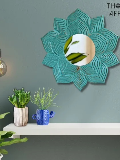 For a touch of playful elegance, this flower-shaped mirror in a distressed turquoise finish is a wonderful choice. It’s a piece of functional art that adds a pop of color and a botanical feel, perfect for a bedroom or a gallery wall.
