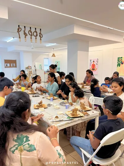 A wider view of our clay Ganesha workshop, showing our spacious and bright studio filled with creative energy.