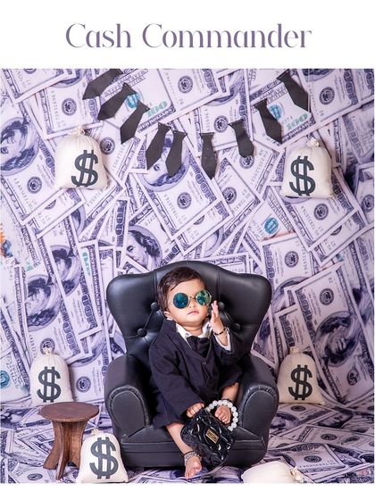 Cash Commander in a million-dollar mood. This little boss is on the phone, making deals from her miniature throne, surrounded by bags of cash.