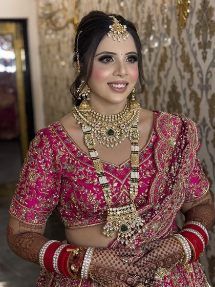 Another angle of this gorgeous bride, showing how the makeup looks beautiful from every side. The soft contouring defines her face shape perfectly.