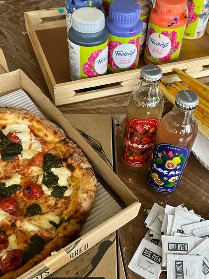 It’s not just about the painting, it’s about the whole experience. We make sure you’ve got the best snacks and drinks to keep the creative energy flowing. Think delicious pizza and refreshing local drinks to go with your art.