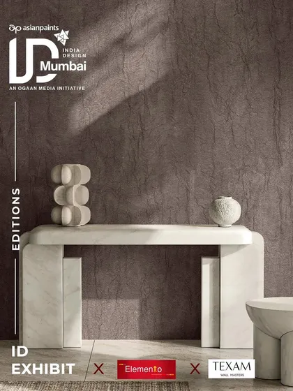This promotional image for our ID Exhibit features a deeply textured wallcovering from Texam. Its subtle, organic pattern provides a dramatic yet elegant backdrop for a minimalist console table, showcasing the power of texture.