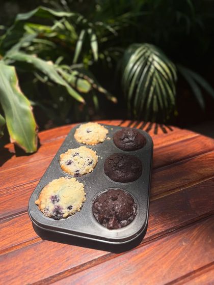 Freshly baked with love. I offer pre-orders for my popular vegan muffins, available in both blueberry and double chocolate chip flavors.