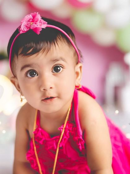 Sweet as a slice of summer! This little girl is celebrating her first birthday with a vibrant and fun watermelon theme.
