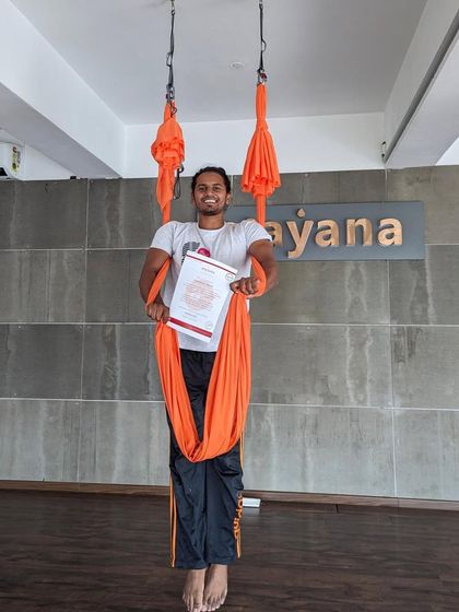 Another happy graduate, certified and ready to share the magic of aerial yoga with the world.