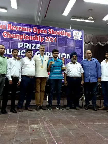 A proud moment with the winners and my team at the 4th Indian Revenue Open Shooting Championship. Managing large-scale events with participants from different states is a core part of my service.