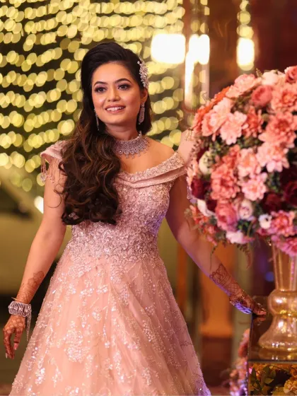 Another beautiful portrait of the bride. Her makeup is soft and minimal, with a luxurious finish that enhances her natural beauty.