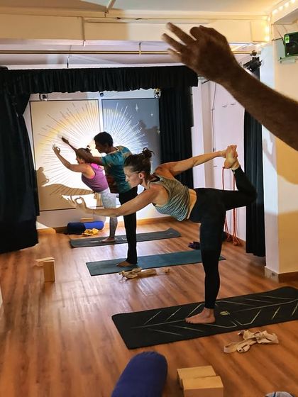 The Natarajasana, or dancer's pose, is a beautiful expression of balance that comes from the mind, not just the body. Here are my students finding their focus in our evening class.