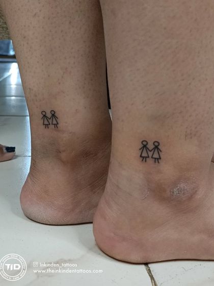 The simplest symbols can hold the deepest meaning. These matching stick-figure tattoos on the ankles of two sisters represent their pure and simple bond of holding hands through life.