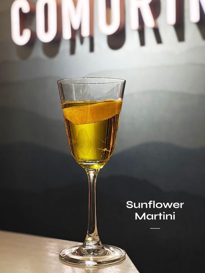The Sunflower Martini, a bright and sunny cocktail. Its golden hue and delicate flavours make it a standout on our limited-edition menu.