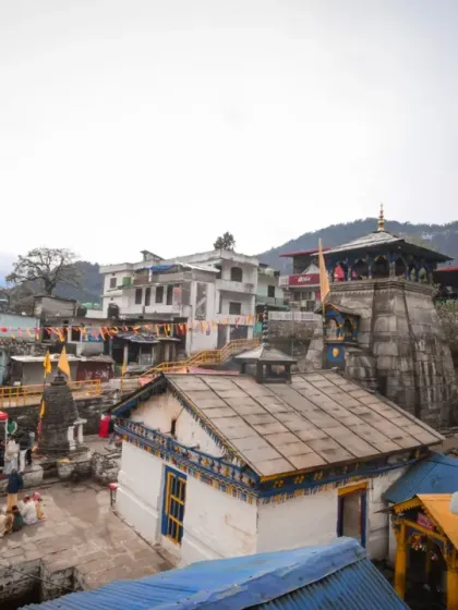 An establishing shot of the temple complex, showing the entire village setup and the preparations for the divine wedding ceremony.